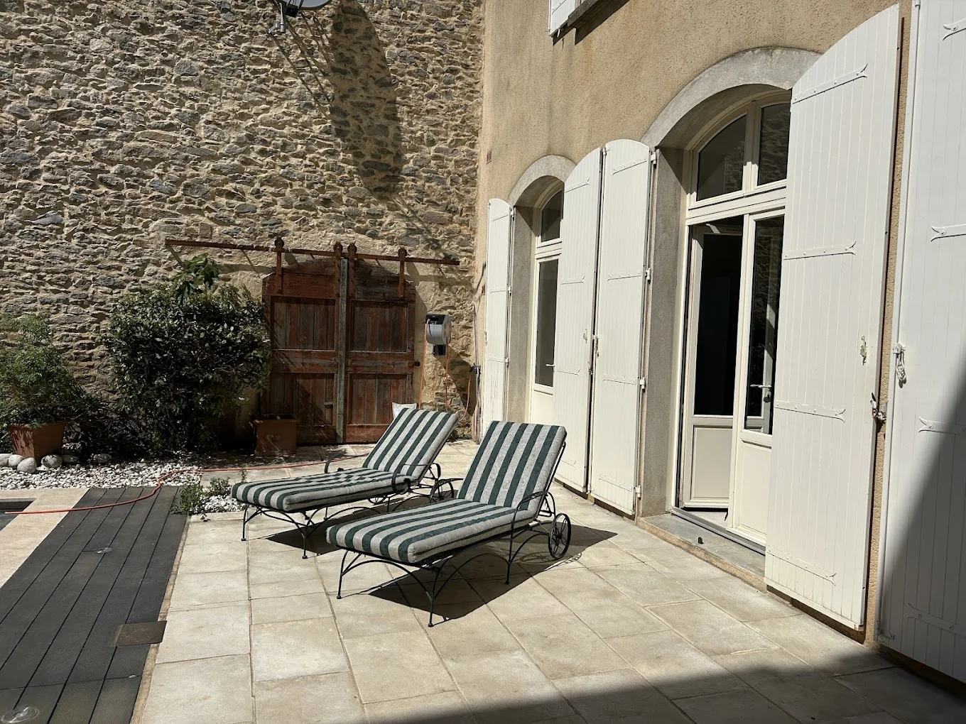 Sun loungers on the terrace by the pool