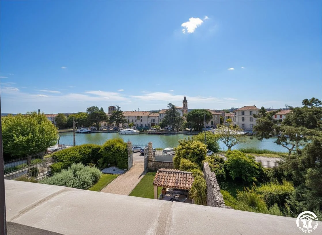 View of the Canal du Midi and the village of Homps